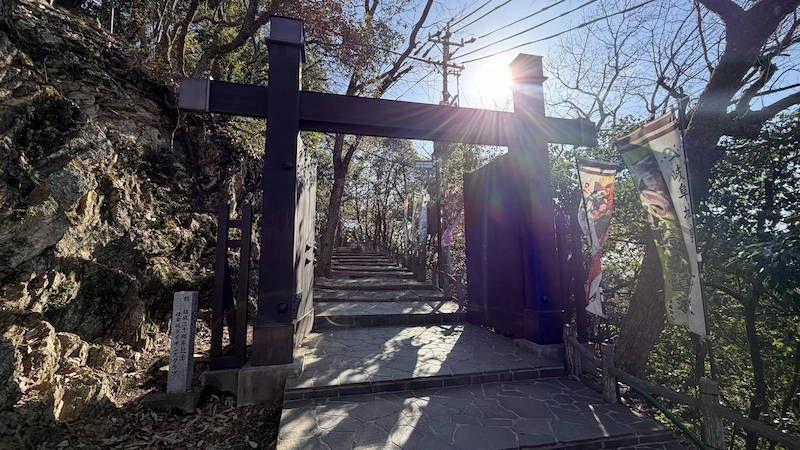 The 'Gate of the Realm' (kabukimon / reconstructed gate) on the upper slope of Mount Kinka