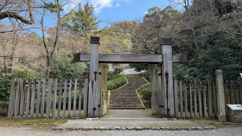 Kabukimon gate inside Gifu Park, standing before the stone steps leading to Lord Nobunaga's Residence Ruins
