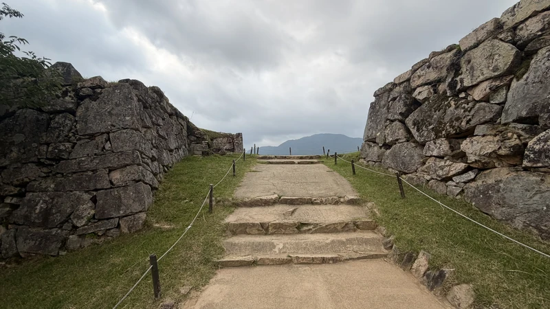 Stone steps leading up to Take-no-mon Gate Site, seen head-on.