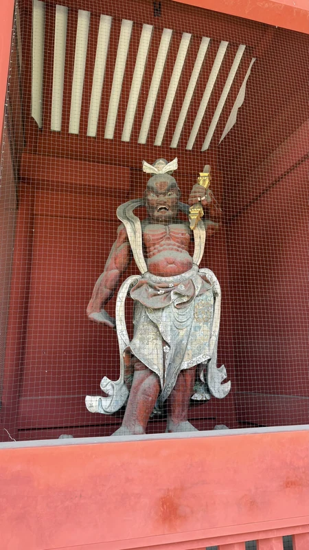 Guardian figure at the former Taitokuin gate