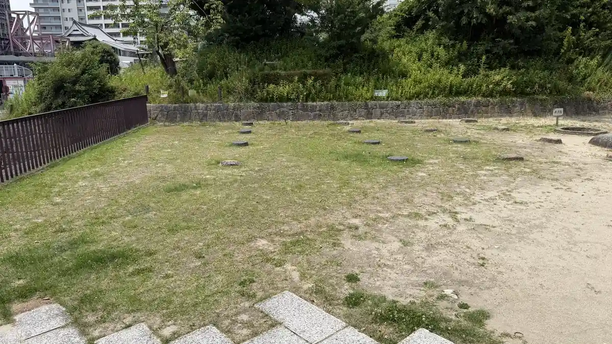 Foundation stones laid out on the lawn to show a building at Arioka Castle