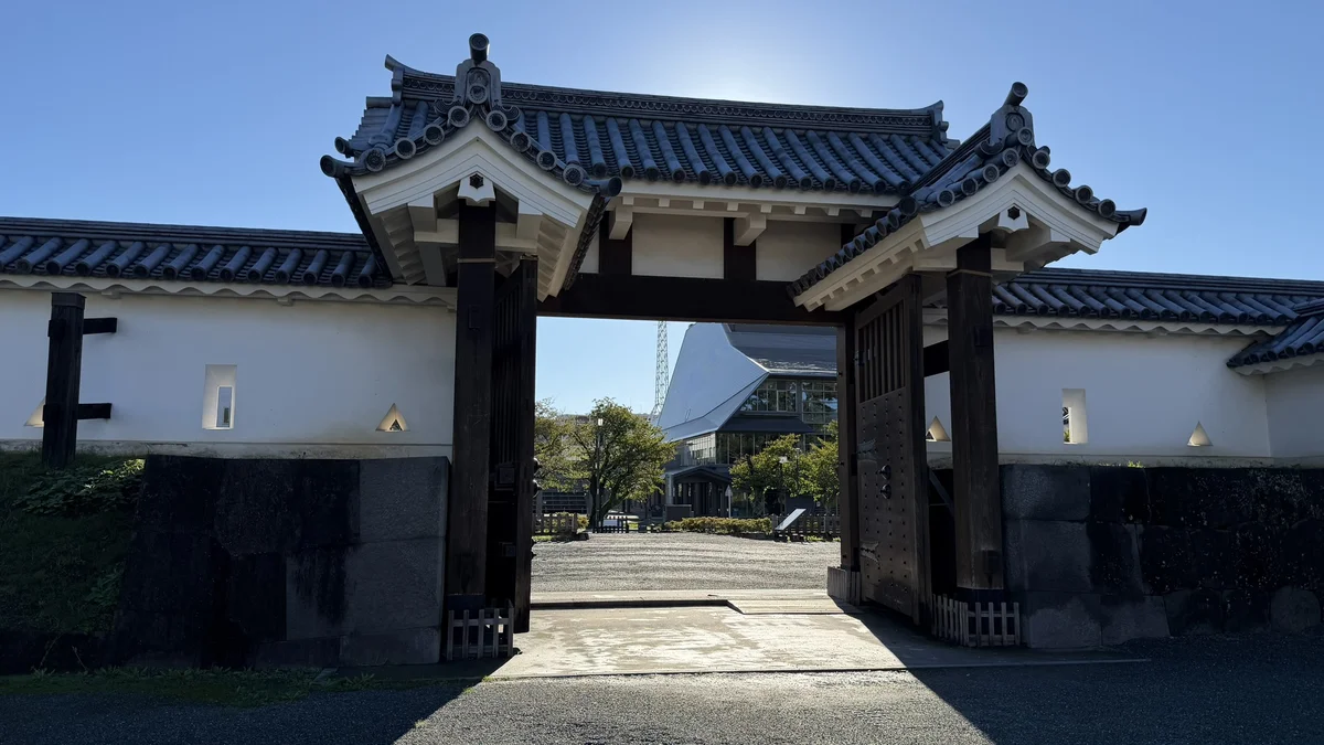 Inner gate and white walls inside the Umadashi Gate courtyard