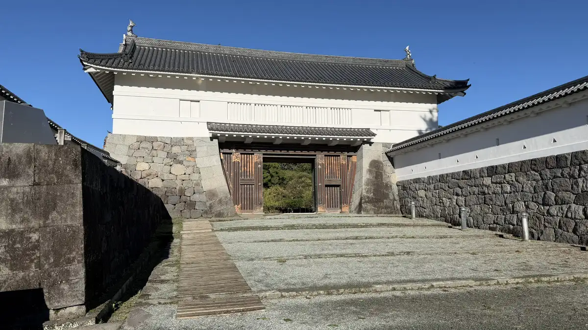 The Akagane Gate, a gatehouse on stone walls, and its courtyard