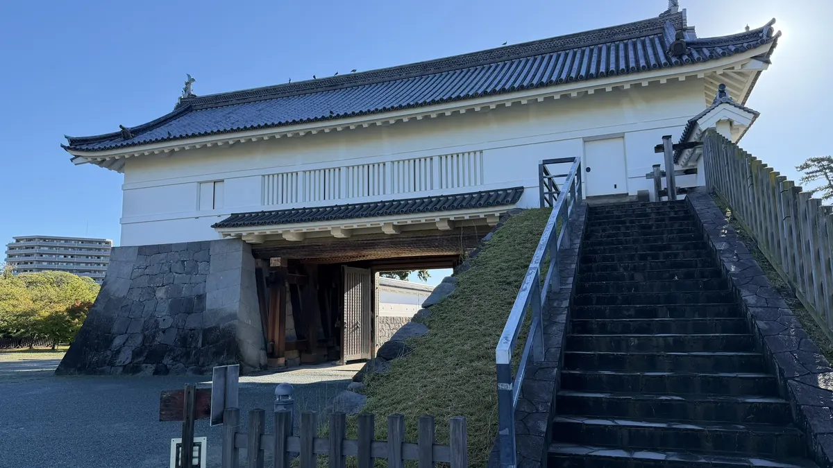 Akagane Gate seen from inside the castle grounds, with the stairway to the upper floor on the right