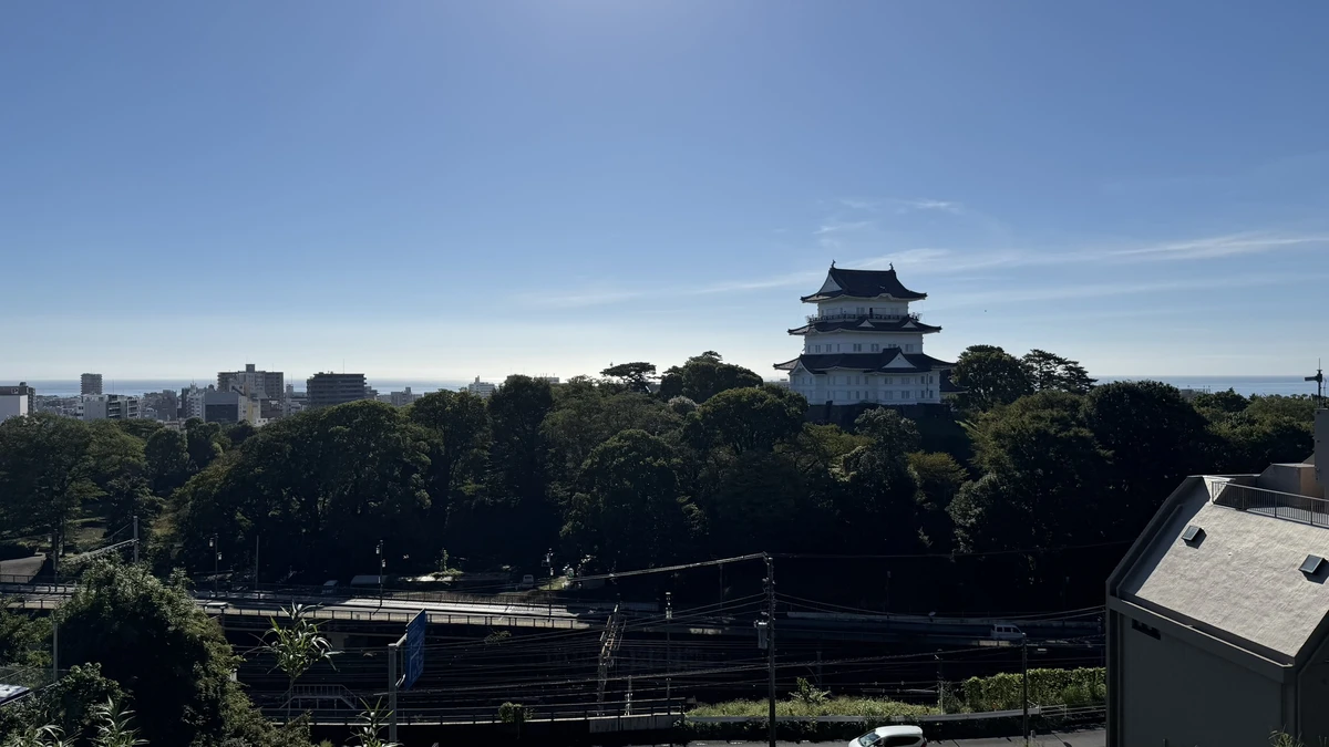 Odawara Castle keep seen across the town from Hachimanyama