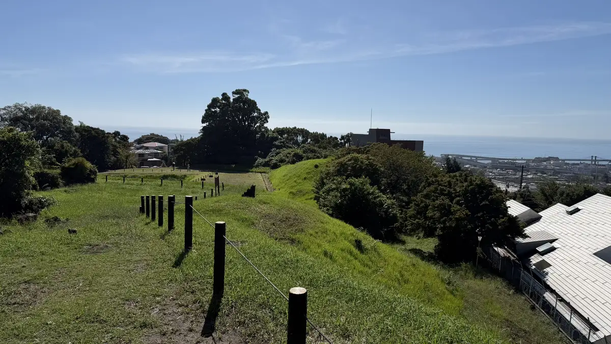 Footpath with wooden posts along the top of the Shinbori ramparts