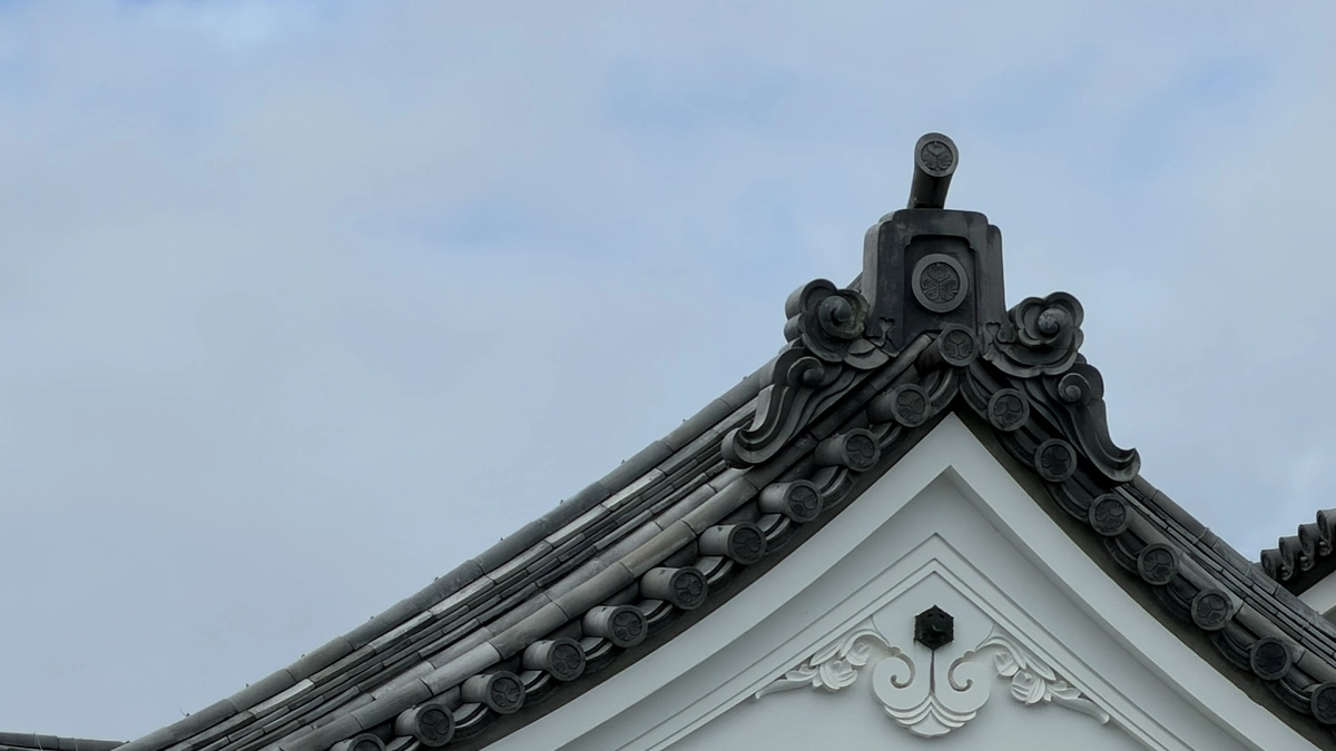 Triple-hollyhock crest roof tile used on the reconstructed keep