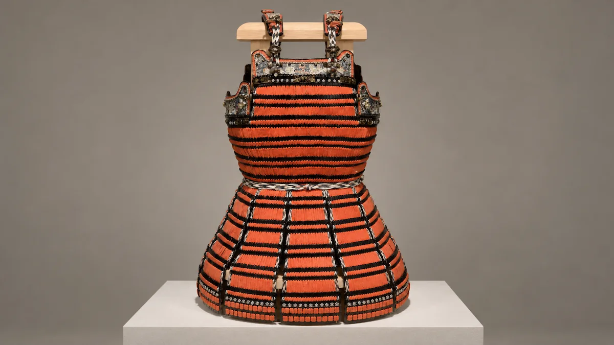 AI-generated image of a red-laced harumaki-style armor on a white pedestal